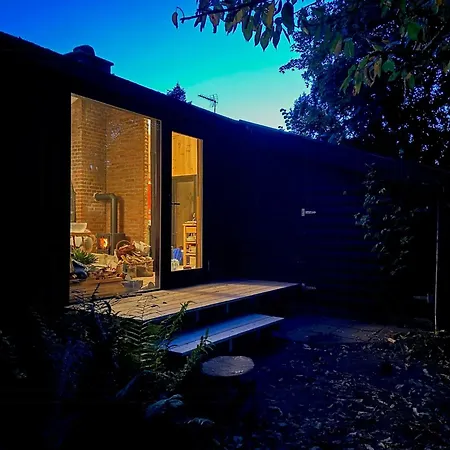Douglas-clad Summer House Near Gribskov *